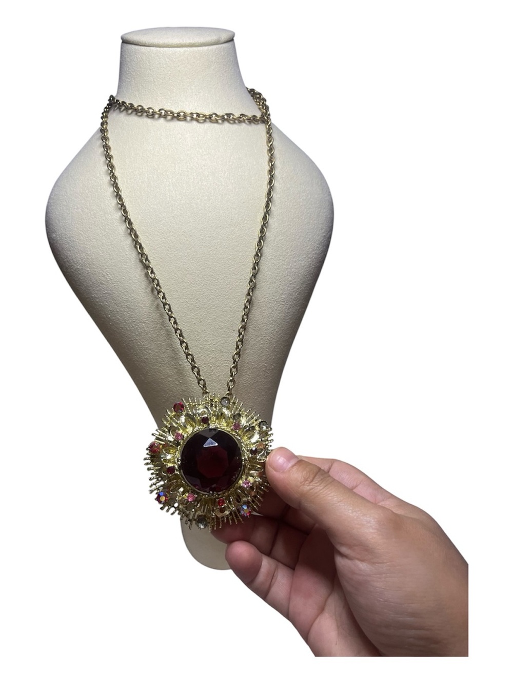 Gold-Tone Necklace with Red Gem Sunburst Pendant